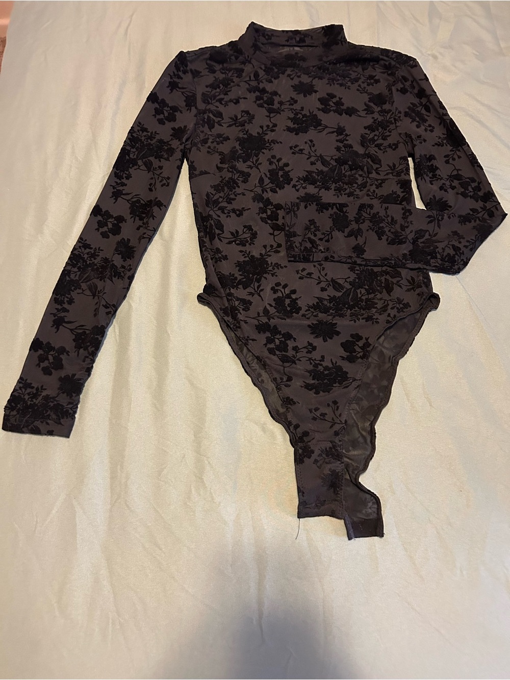 Long Sleeve One-Piece Bodysuit in Black Floral